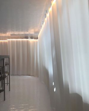 Le Bureau des philanthropes by Ramy Fishler this morning at AD interieurs presentation in Paris. Beautiful curtains and wonderful curtain rod light fixtures. @ramy_fischler #adinterieurs #white #whitespace #lightfixture #modernicons #woth #wonderful #won