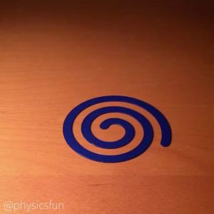 Fascinating spinning top! 
#Repost @physicsfun
・・・
Magnetic Tip Spinning Top; the top stays on the perimeter of the steel plate spiral- but since the top is more massive, the spiral moves with curious motion. This kinetic art toy takes advantage of Newton